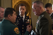 Marine Corps Gen. Joseph F. Dunford Jr., chairman of the Joint Chiefs of Staff, right, speaks with Gen. Juan Pablo Rodriguez, commander of Colombia's armed forces, before meet with Colombian President Juan Manuel Santos at the Palacio de Narino in Bogota, Colombia, March 10, 2016. DoD photo by Navy Petty Officer 2nd Class Dominique A. Pineiro