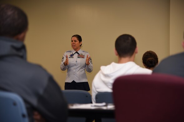 Master Sgt. Dominique Hogan, the senior recruiter for the 403rd Wing, talks to a group of new recruits that are part of the Deployment Training and Flight for the wing. This group is designed to give recruits the tools needed to succeed in basic training. (US Air Force photo/Staff Sgt. Nicholas Monteleone)