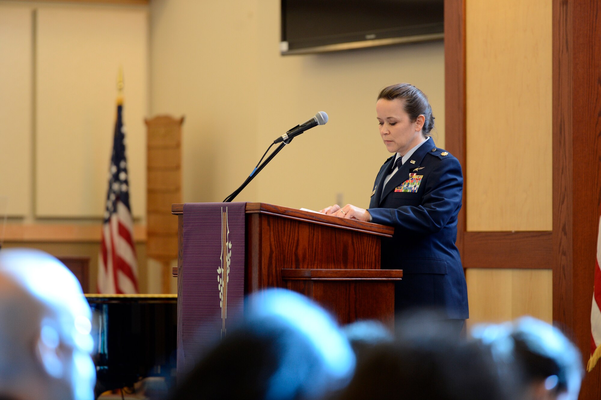 Maj. Staci Rembold, 436th Communications Squadron commander, speaks during a memorial service at the base chapel March 11, 2016, on Dover Air Force Base, Del. Memorial services were held in remembrance of Senior Airman Keifer C. Huhman, 21, a native of Honolulu, Hawaii. (U.S. Air Force photo/Tech. Sgt. Elizabeth Morris)