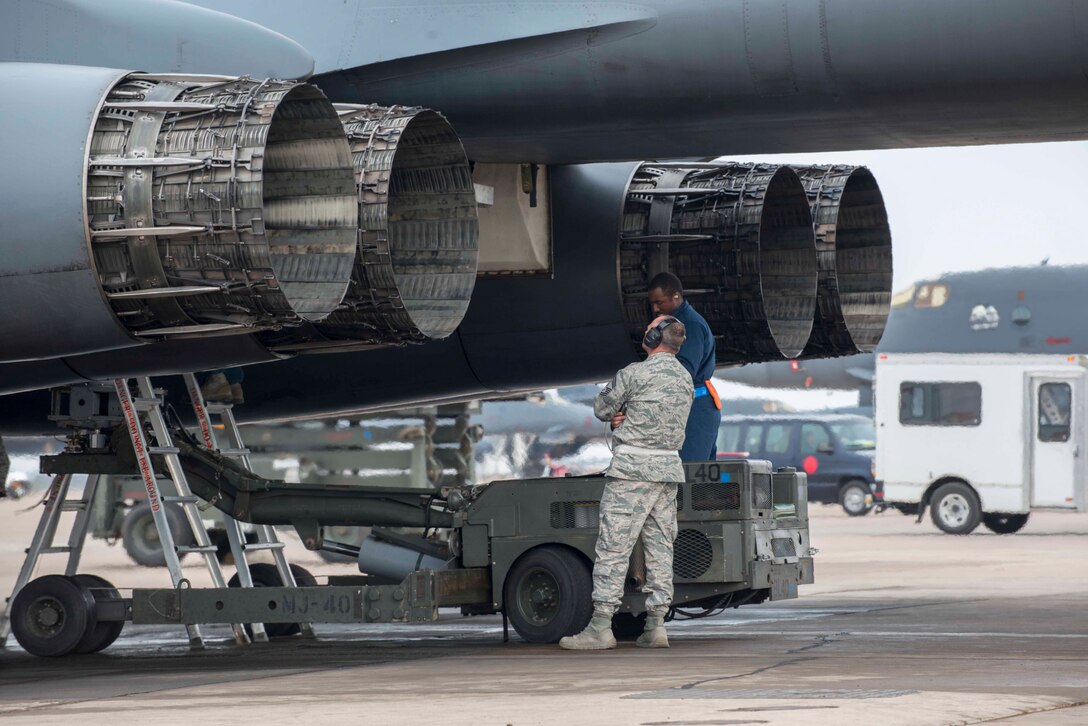 Airmen assigned to the 7th Maintenance Group supervise the bomb load of an inert Joint Air-to-Surface Standoff Missile in the bomb bay of a B-1B Lancer Feb. 21, 2016, at Dyess Air Force Base, Texas, during the first-ever B-1 Block 16 Combat Mission Effectiveness exercise. During the exercise, six B-1s were prepped and deployed within 48 hours of being tasked. (U.S. Air Force photo by Airman 1st Class Austin Mayfield/ Released)