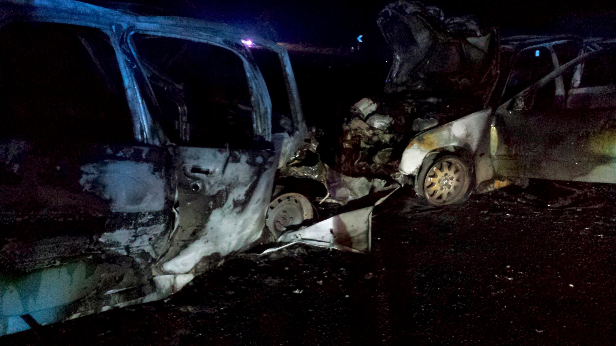 What is left of two cars after a potentially fatal accident sits on the side of the road May 12, 2014, near RAF Mildenhall, England. Staff Sgt. Vicente Gomez, 100th Aircraft Maintenance Squadron crew chief, performed life-saving assistance to the victims of the crash. Gomez was presented with the Airman’s Medal for his courageous acts. (Courtesy photo)