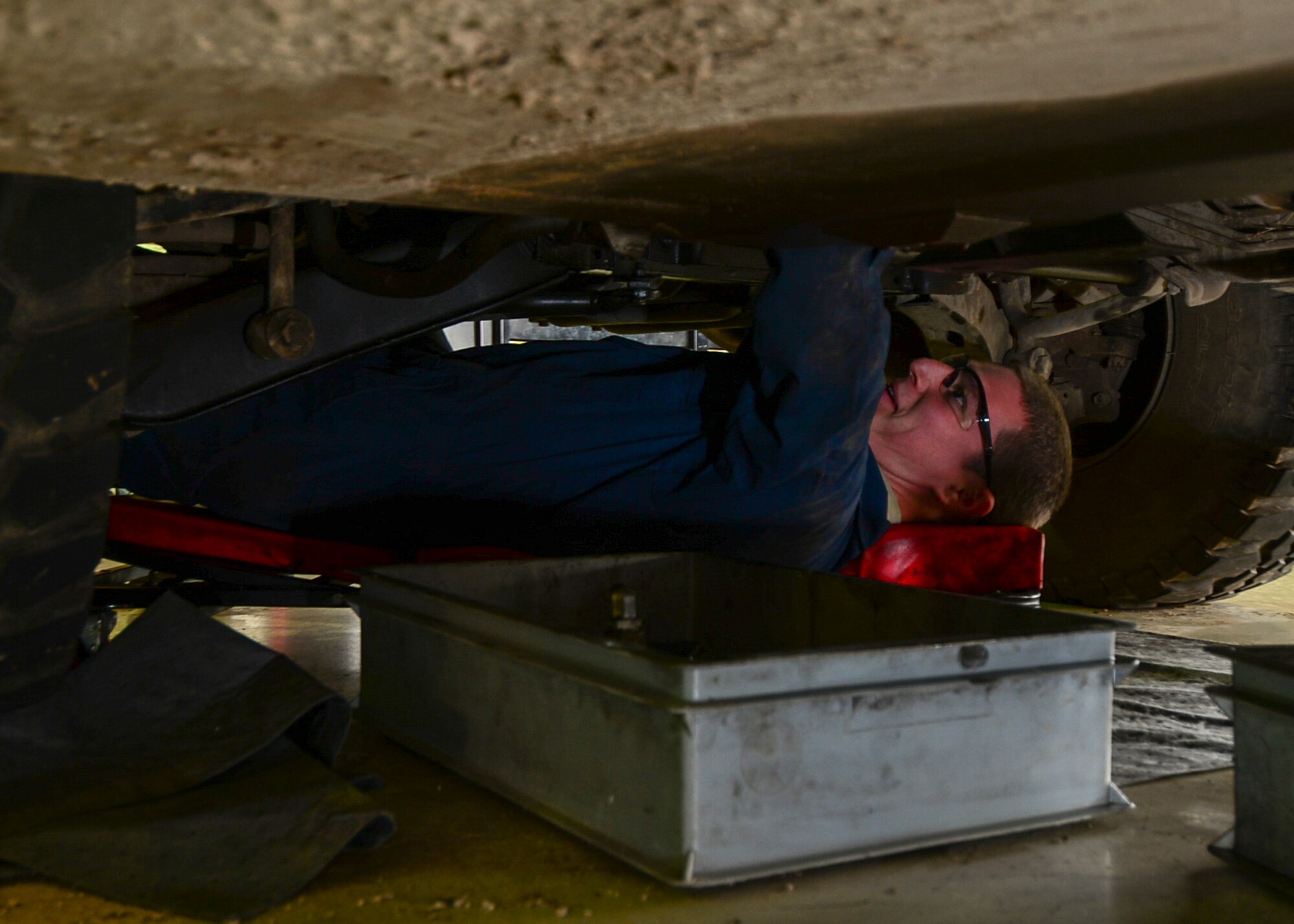 Senior Airman Josh Martinez, 31st Logistics Readiness Squadron vehicle maintenance journeyman, performs maintenance on a Humvee March 2, 2015, at Aviano Air Base, Italy. In fiscal year 2016, there have been a total of 33 accidents involving Government-Owned Vehicles. (U.S. Air Force photo by Airman 1st Class Cory W. Bush/Released)