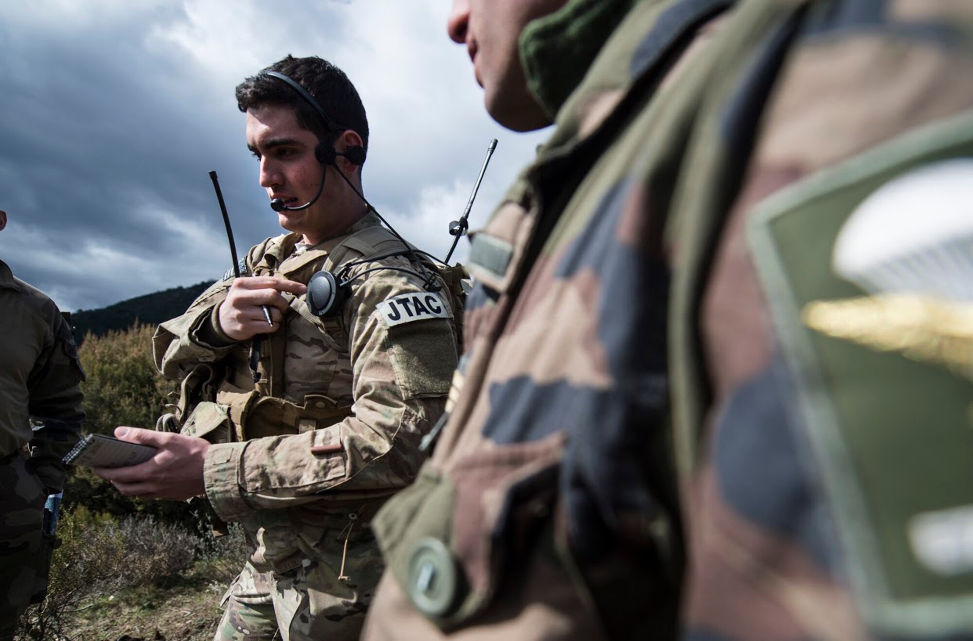 Senior Airman Gage Duvall, 2nd Air Support Operations Squadron joint terminal attack controller, guides aircraft during a training scenario during exercise Serpentex 16, March 9, 2016. Serpentex 16 is an annual French-led exercise that is designed to enhance NATO operations and training between allies and partners. Multiple NATO countries worked together throughout the exercise in order to better learn each other’s capabilities and improve in areas that fellow JTACs would be able to help. (U.S. Air Force photo/Staff Sgt. Sara Keller)