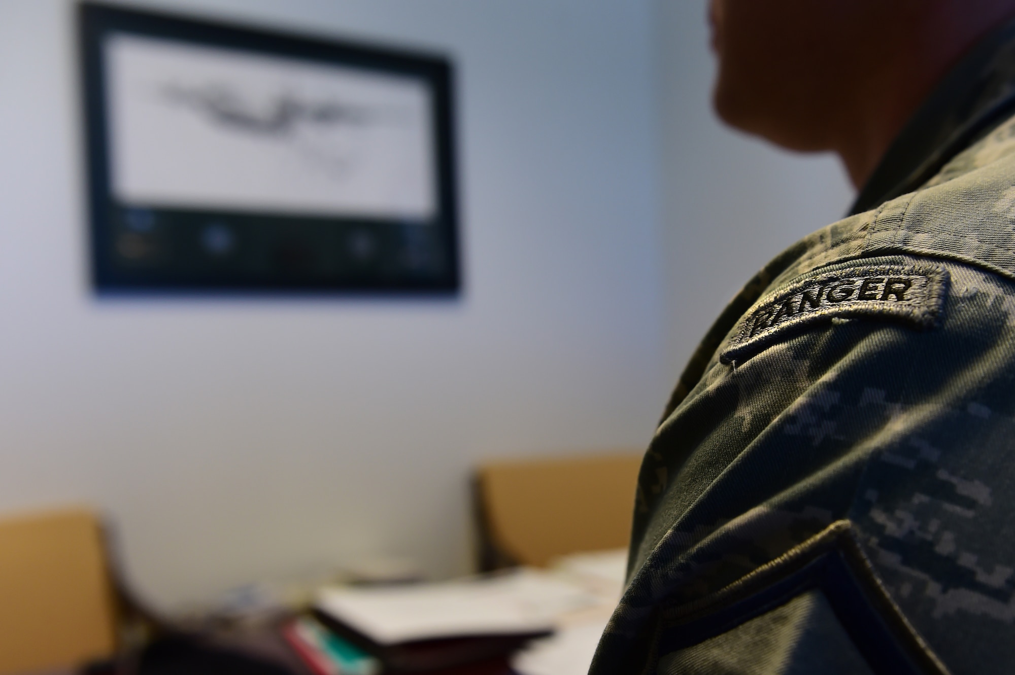 Master Sgt. Michael Burke, 460th Security Forces Squadron, wears a Ranger Tab on his left shoulder March 10, 2016, on Buckley Air Force Base, Colo. Burke graduated from the Army Ranger School in 2008 and was awarded the Enlisted Leadership Award for his class. He is one of only two Airmen who have won awards at Ranger School since 1954. (U.S. Air Force photo by Airman 1st Class Luke W. Nowakowski/Released)