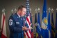 Chief Master Sgt. Vance Kondon pauses during his retirement speech at the Community Commons on Joint Base Andrews, Md., March 11, 2016. The Chief retired after 30 years of service, spending two years as command chief at JBA. (U.S. Air Force photo by Senior Airman Mariah Haddenham / Released)