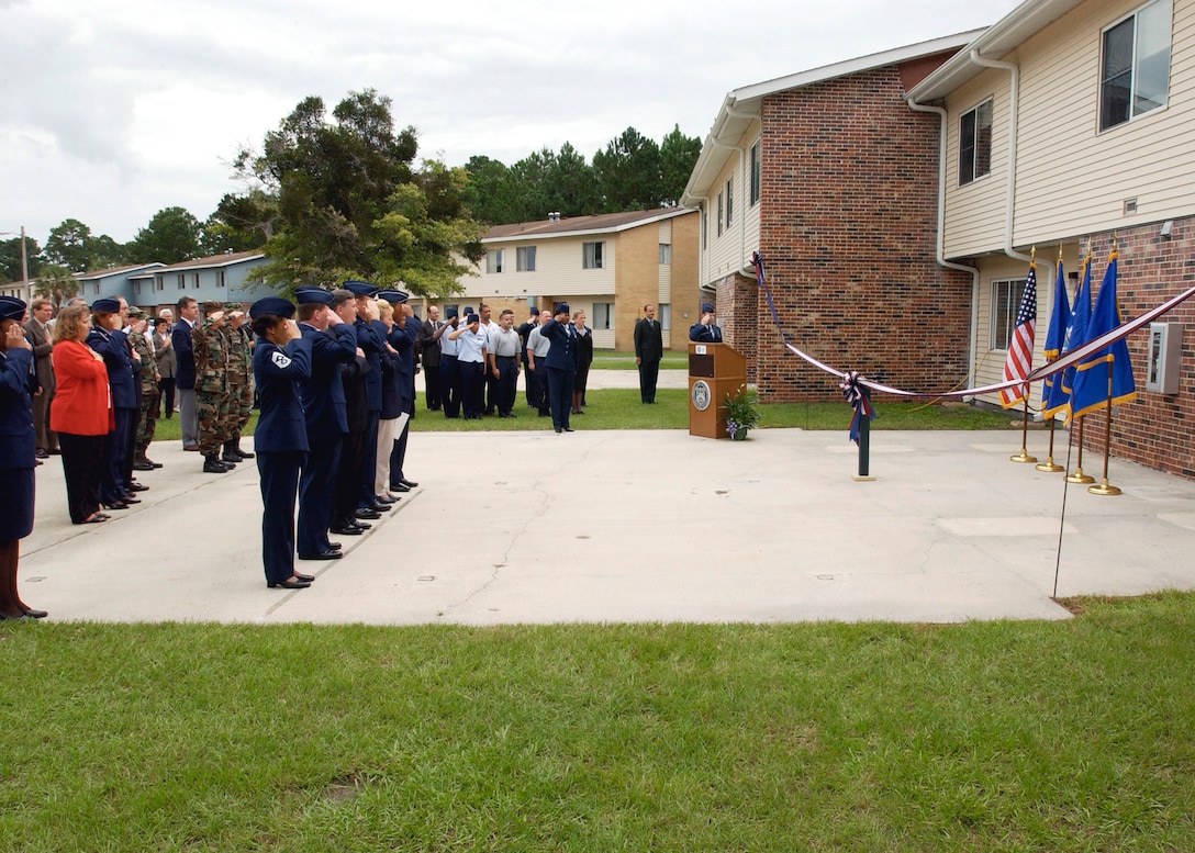 A ribbon-cutting ceremony marked the United States Air Force Office of Special Investigations Academy's official entrance to the Federal Law Enforcement Training Center in Glynco, Ga., on Oct. 3, 2002, with Col. Dennis Keith taking command. (USAFSIA photo)    
