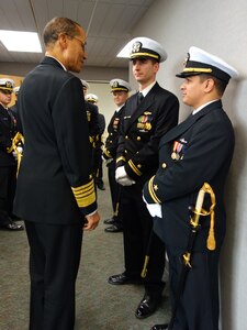 U.S. Navy Adm. Cecil D. Haney (left), U.S. Strategic Command (USSTRATCOM) commander, speaks to junior officers before providing remarks and presiding over the USS Nevadaâ€™s (SSBN 733) Blue Crew change of command ceremony at the Keyport Submarine Museum, Keyport, Wash., March 11, 2016. The USS Nevada is an Ohio-class ballistic missile submarine based in Bangor, Wash., and is assigned to Submarine Force, U.S. Pacific Fleet (COMSUBPAC). COMSUBPAC, also designated as USSTRATCOMâ€™s Task Force 134, provides launch capability from around the globe using the Trident missile weapon system in support of USSTRATCOMâ€™s strategic deterrence mission. One of nine DoD unified combatant commands, USSTRATCOM has global strategic missions, assigned through the Unified Command Plan, which include strategic deterrence; space operations; cyberspace operations; joint electronic warfare; global strike; missile defense; intelligence, surveillance and reconnaissance; combating weapons of mass destruction; and analysis and targeting. (USSTRATCOM photo by U.S. Navy Capt. Pamela S. Kunze)