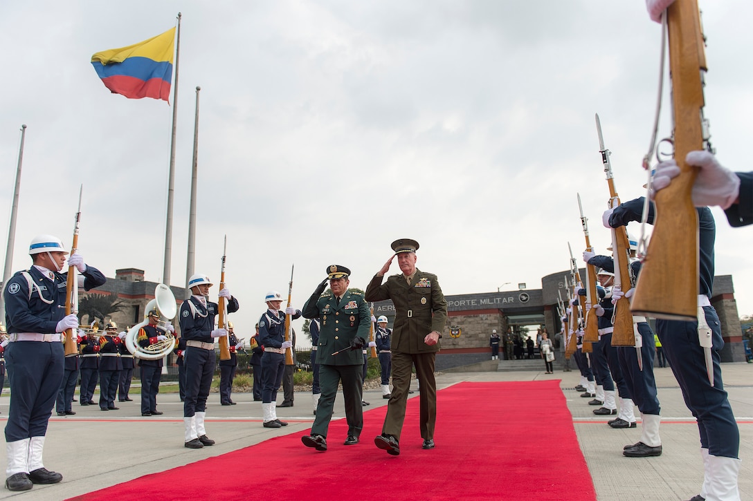 Marine Corps Gen. Joseph F. Dunford Jr., chairman of the Joint Chiefs of Staff, right, passes through a Colombian honor guard with Gen. Juan Pablo Rodriguez, commander of Colombia's armed forces, as he departs Bogota, Colombia, March 10, 2016. DoD photo by Navy Petty Officer 2nd Class Dominique A. Pineiro