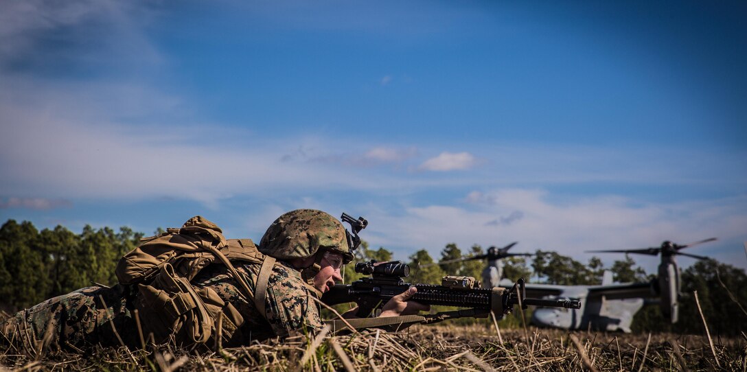 Lance Cpl. Ronald Hester, a combat engineer with, provides security for a casualty evacuation exercise at Landing Zone Penguin at Camp Lejeune, N.C., March 10, 2016. The training allowed Marines with Marine Medium Tiltrotor Squadron 365 and 2nd CEB to work together in order to be well prepared to conduct a successful CASEVAC in any situation they may encounter while deployed, to ultimately saves lives.  (U.S. Marine Corps photo by Lance Cpl. Erick Galera/Released)
