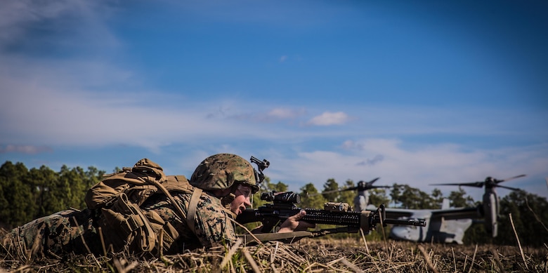 Lance Cpl. Ronald Hester, a combat engineer with, provides security for a casualty evacuation exercise at Landing Zone Penguin at Camp Lejeune, N.C., March 10, 2016. The training allowed Marines with Marine Medium Tiltrotor Squadron 365 and 2nd CEB to work together in order to be well prepared to conduct a successful CASEVAC in any situation they may encounter while deployed, to ultimately saves lives.  (U.S. Marine Corps photo by Lance Cpl. Erick Galera/Released)