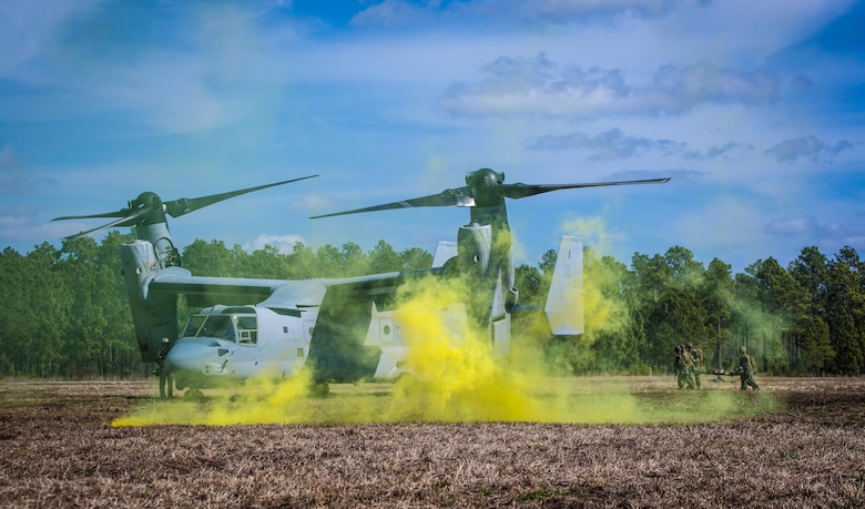 Marines with with 2nd Combat Engineer Battalion, run to load a casualty onto an MV-22B Osprey during a casualty evacuation exercise at Landing Zone Penguin at Camp Lejeune, N.C., March 10, 2016. The training allowed Marines with Marine Medium Tiltrotor Squadron 365 and 2nd CEB to work together in order to be well prepared to conduct a successful CASEVAC in any situation they may encounter while deployed, to ultimately save lives.  (U.S. Marine Corps photo by Lance Cpl. Erick Galera/Released)