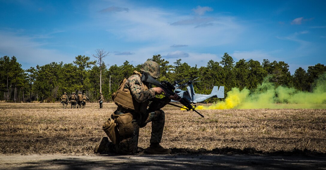 PFC Jeremiah McGuire, a combat engineer with, provides security for a casualty evacuation exercise at Landing Zone Penguin at Camp Lejeune, N.C., March 10, 2016. The training allowed Marines with Marine Medium Tiltrotor Squadron 365 and 2nd CEB to work together in order to be well prepared to conduct a successful CASEVAC in any situation they may encounter while deployed, to ultimately save lives.  (U.S. Marine Corps photo by Lance Cpl. Erick Galera/Released)