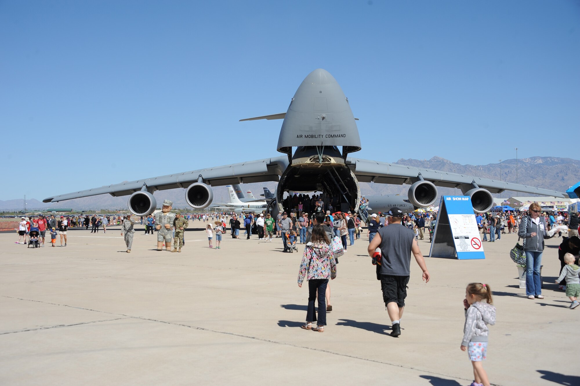 U.S. Air Force C-5 Galaxy static display rests on the flightline during Thunder and Lightning over Arizona Open House at Davis-Monthan Air Force Base, Ariz., March 12, 2016. The Open House showcased military air power as well as gave the community members an opportunity to interact with D-M’s Airmen. There were 12 aerial demonstrations and 51 aircraft static displays showcased a day. (U.S. Air Force photo by Airmen 1st Class Ashley N. Steffen/Released)