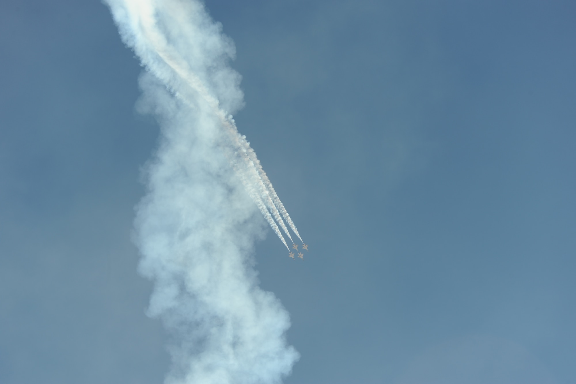 The U.S. Air Force Air Demonstration Squadron, the Thunderbirds, performs a line breast loop the Thunder and Lightning over Arizona Open House at Davis-Monthan Air Force Base, Ariz., March 13, 2016. The aerial demonstrations exhibited some of the maximum capabilities of the F-16 Fighting Falcon, the Air Force’s premier multi-role fighter jet. For each Thunderbirds F-16 aircraft that travels, a crew chief and an assistant crew chief are assigned to it, ensuring their jet is always mission-ready. (U.S. Air Force photo by Airman Nathan H. Barbour/Released)