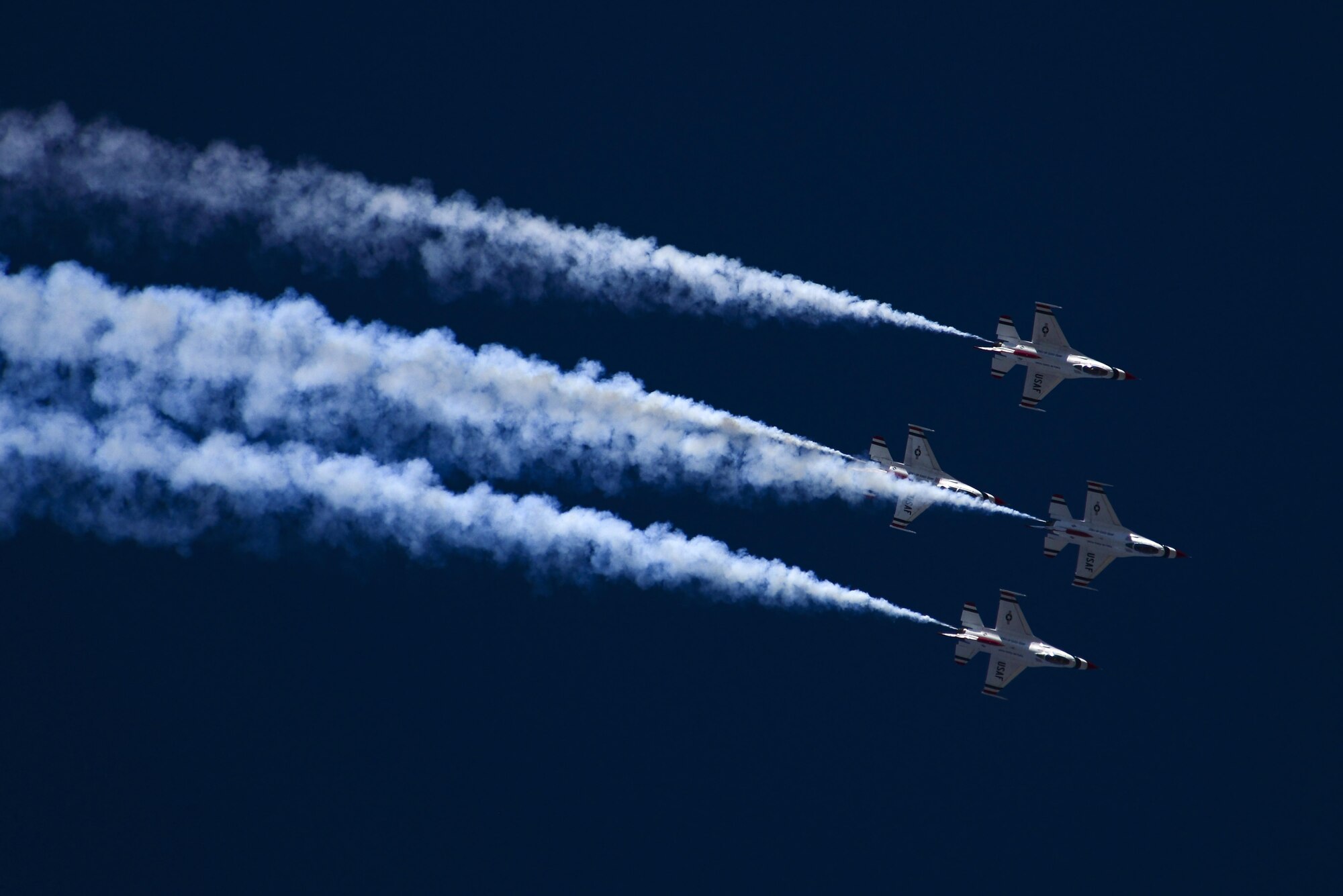 U.S. Air Force Air Demonstration Squadron, the Thunderbirds, fly in a diamond formation during the Thunder and Lightning over Arizona Open House event at Davis-Monthan Air Force Base, Ariz., March 12, 2016. The hour-long demonstration gave spectators the chance to witness the precise maneuvers and capabilities exhibited by these F-16 Fighting Falcon pilots. (U.S. Air Force photo by Senior Airman Chris Drzazgowski/Released)