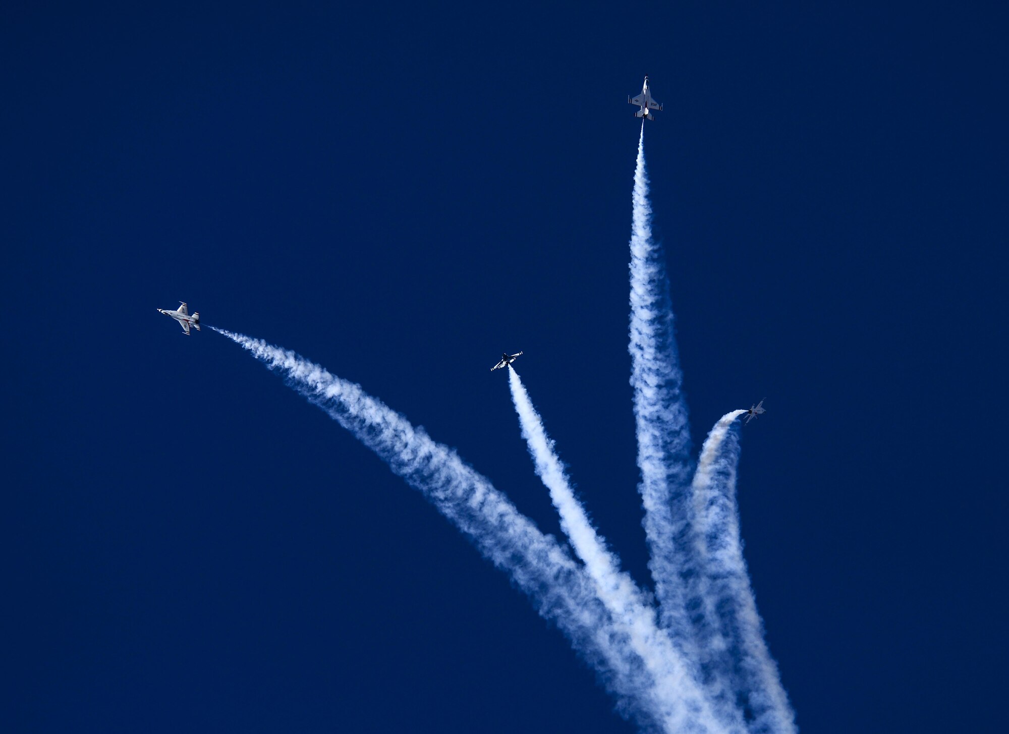 U.S. Air Force Air Demonstration Squadron, the Thunderbirds, perform a “Bomb Burst” aerial maneuver during the Thunder and Lightning over Arizona Open House event at Davis-Monthan Air Force Base, Ariz., March 12, 2016. The hour-long demonstration gave spectators the chance to witness the precise maneuvers and capabilities exhibited by these F-16 Fighting Falcon pilots. (U.S. Air Force photo by Senior Airman Chris Drzazgowski/Released)