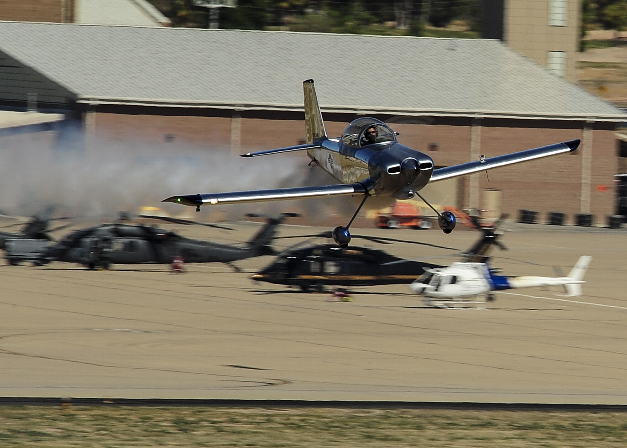 Joe Shetterly, Van’s RV-8 pilot, performs an aerobatic demonstration during the Thunder and Lightning over Arizona Open House event at Davis-Monthan Air Force Base, Ariz., March 12, 2016. The open house featured aerial demonstrations from various teams and numerous static displays allowing the public to gain a better understanding of the Air Force. (U.S. Air Force photo by Senior Airman Chris Drzazgowski/Released)