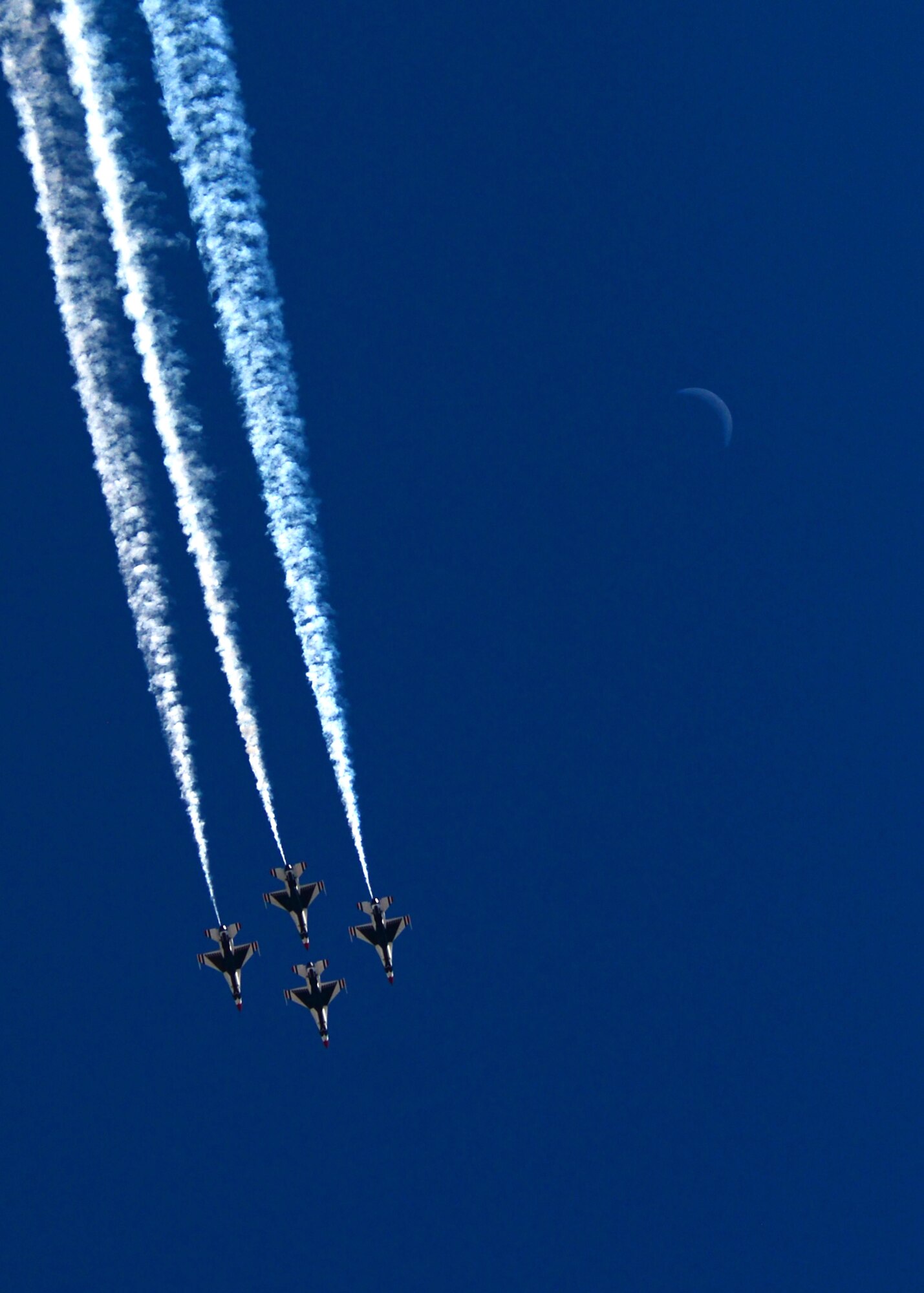 U.S. Air Force Air Demonstration Squadron, the Thunderbirds, fly in a diamond formation during the Thunder and Lightning over Arizona Open House event at Davis-Monthan Air Force Base, Ariz., March 12, 2016. The hour-long demonstration gave spectators the chance to witness the precise maneuvers and capabilities exhibited by these F-16 Fighting Falcon pilots. (U.S. Air Force photo by Senior Airman Chris Drzazgowski/Released)
