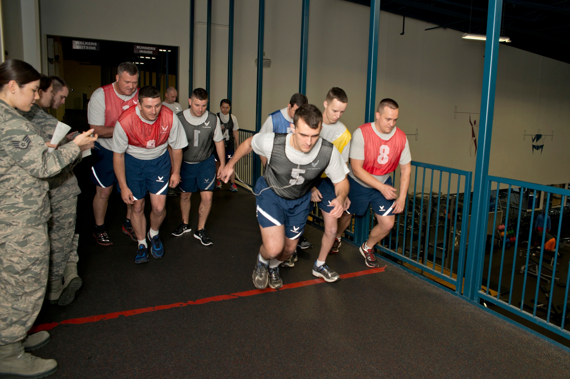 U.S. Air Force Reservists assigned to the 913th Airlift Group begin the run portion of their physical fitness assessment test at Little Rock Air Force Base, Ark., Mar. 12, 2016. The Air Force uses and overall composite fitness score and minimum scores per component based on aerobic fitness (1.5-mile timed run), body composition (abdominal circumference measurements) and muscular fitness components (pushups and situps) to determine overall fitness. (U.S. Air Force photo by Master Sgt. Jeff Walston/Released)

