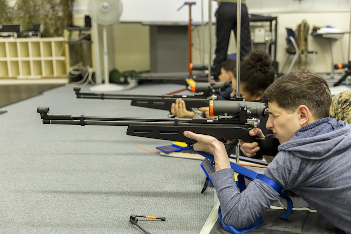 Tyler Gilbert, a Matthew C. Perry High School student and Junior Reserve Officer Training Corps cadet sights in during marksmanship practice at Marine Corps Air Station Iwakuni, Japan, March 8, 2016. The JROTC cadets took top honors during the Far East Marksmanship Competition at Camp Humphreys, Korea, Feb. 14-16, 2016, and the drill competition at Yokota Air Force Base, Japan, Nov. 16-18, 2015. M.C. Perry made it to the championship round of the marksmanship competition before beating the Sasebo, Guam and Kubasaki JROTC cadets.
(U.S. Marine Corps photo by Lance Cpl. Aaron Henson/Released)
