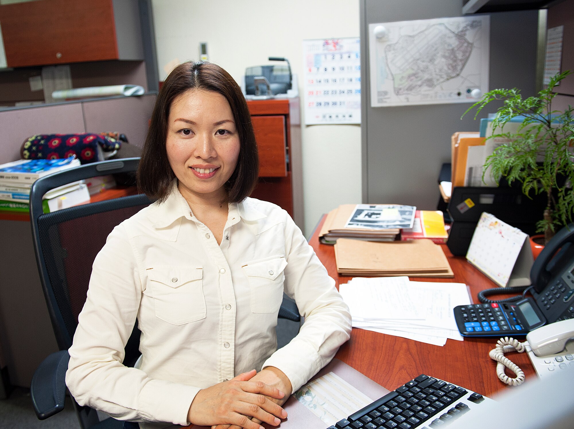 Ayano Kinjo, 18th Civil Engineer Squadron facilities repair estimator, works at the 18th CES Heating, Ventilation, Air Conditioning and Refrigeration shop, March 9, 2016, at Kadena Air Base, Japan. Kinjo has worked in her current position as a facilities repair estimator for more than five years. As a facilities repair estimator, Kinjo requests local vendors to create quotes of supply for 18th Civil Engineer Squadron or sourcing for all work requests involving the repair, replacement and installation of property facilities. (U.S. Air Force photo by Naoto Anazawa)
