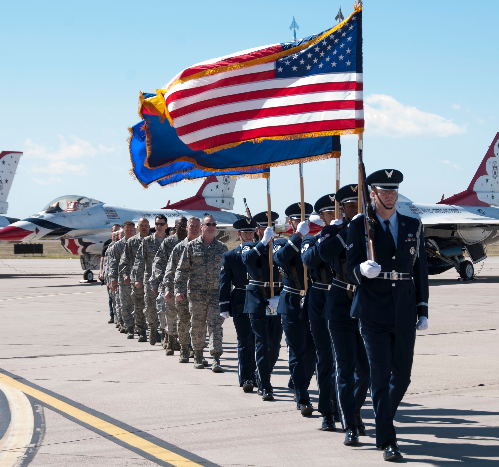 Honor Guard members from the Arizona Air National Guard’s 162nd Wing and Davis-Monthan Air Force Base stood proudly displaying the colors of our great nation and the state of Arizona during an enlistment ceremony at D-M’s “Thunder and Lightning over Arizona” March 12.  Guard members are proud to highlight the outstanding relationship between D-M, the United States Air Force and the Tucson community at this year’s event. (U.S. Air National Guard photo by Staff Sgt. Gregory Ferreira/Released)


