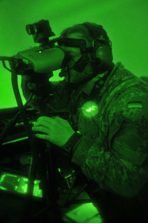 A picture of German armed forces Capt. Sebastian Pflueger, Joint Terminal Attack Controller (JTAC) with the 26th Airborne Regiment in Zweibrücken, Germany, training in the 227th Air Support Operations Squadron's new $1.2 million Air National Guard Advanced JTAC Training System.