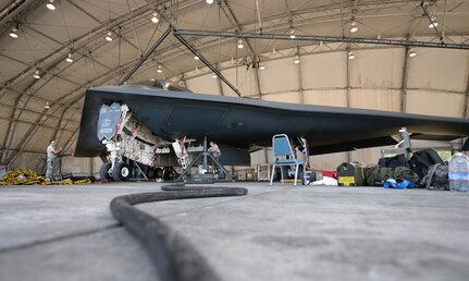 Maintainers from Whiteman Air Force Base, Mo., perform a gear swing on a U.S. B-2 Spirit bomber March 13, 2016, in the U.S. Pacific Command area of operations. Strategic Command bombers regularly deploy to the Indo-Asia-Pacific region to conduct PACOM-led operations which provide leaders deterrence options to maintain regional stability. (U.S. Air Force photo by Senior Airman Joel Pfiester/Released)