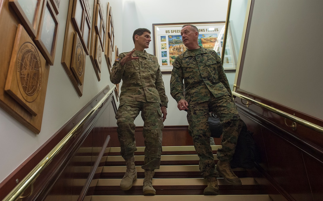 Marine Corps Gen. Joseph F. Dunford Jr., chairman of the Joint Chiefs of Staff, right, and Army Gen. Joseph L. Votel, commander of U.S. Special Operations Command, depart Socom headquarters on MacDill Air Force Base, Fla., March 11, 2016. DoD photo by Navy Petty Officer 2nd Class Dominique A. Pineiro