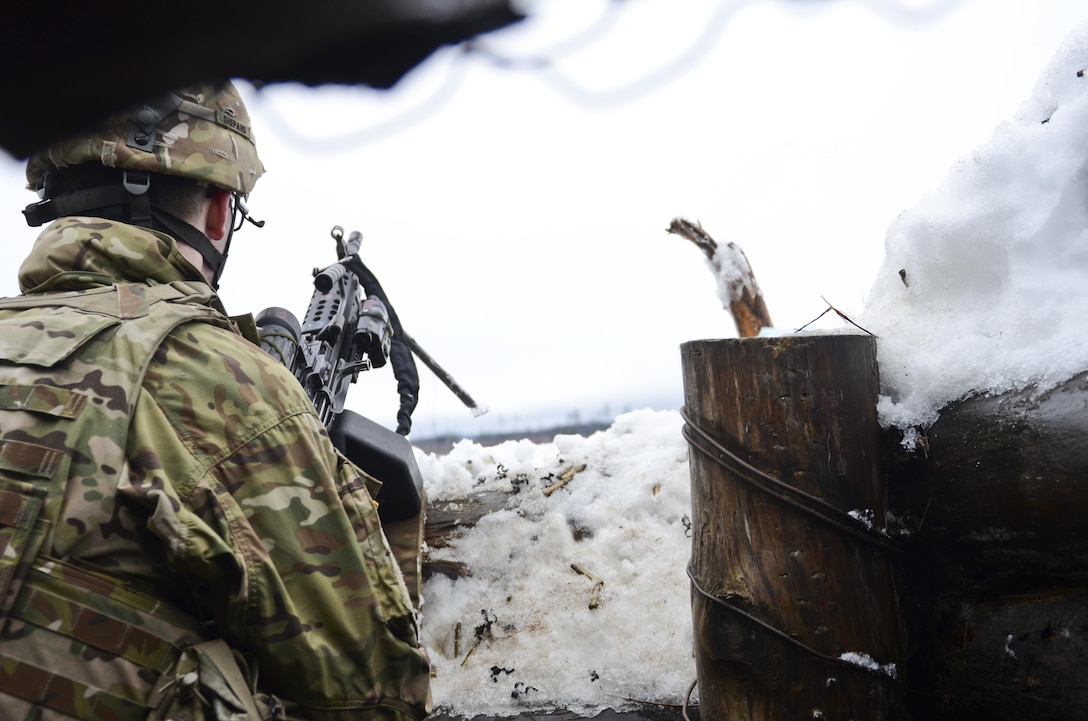Army Spc. Jeff Richardson positions himself to cover his sector of fire during a live-fire exercise at Tapa Training Area in Estonia, March 12, 2016. Richardson is an infantryman assigned to the 3rd Squadron, 2nd Cavalry Regiment. Army photo by Staff Sgt. Steven M. Colvin