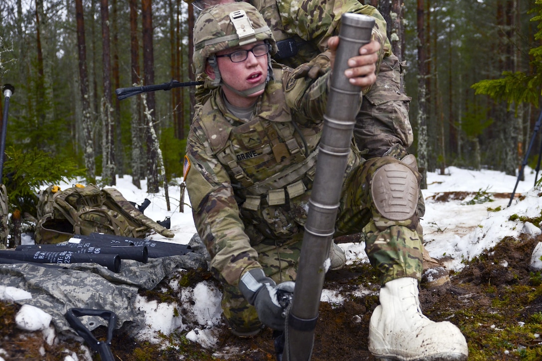 Army Pvt. Tyler Gravely acquires his target during a live-fire exercise at Tapa Training Area in Estonia, March 12, 2016. Gravely is a 60mm mortar gunner assigned to the 3rd Squadron, 2nd Cavalry Regiment. Army photo by Staff Sgt. Steven M. Colvin