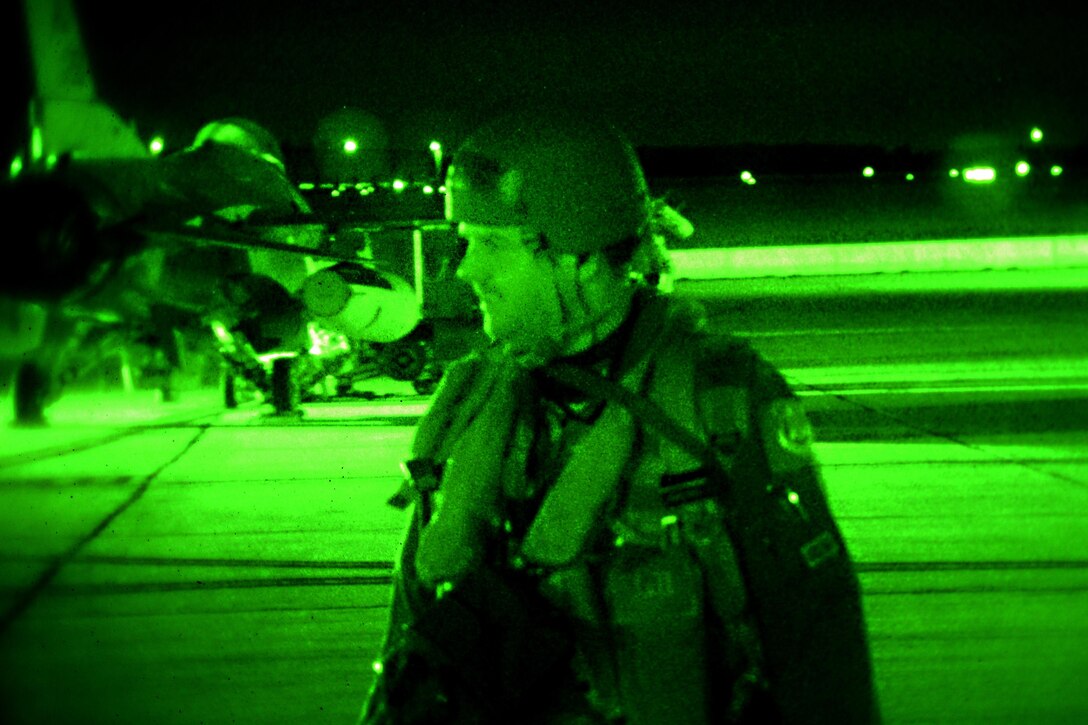 As seen through a night-vision device, Air Force Maj. James McCroan departs the flight line after completing an evening sortie in an F-16 Fighting Falcon aircraft during Exercise Dastardly Devil 16-1 at the Atlantic City Air National Guard Base, N.J., March 12, 2016. McCroan is a pilot assigned to the New Jersey Air National Guard’s 177th Fighter Wing, 119th Fighter Squadron. New Jersey Air National Guard photo by Tech. Sgt. Andrew Merlock