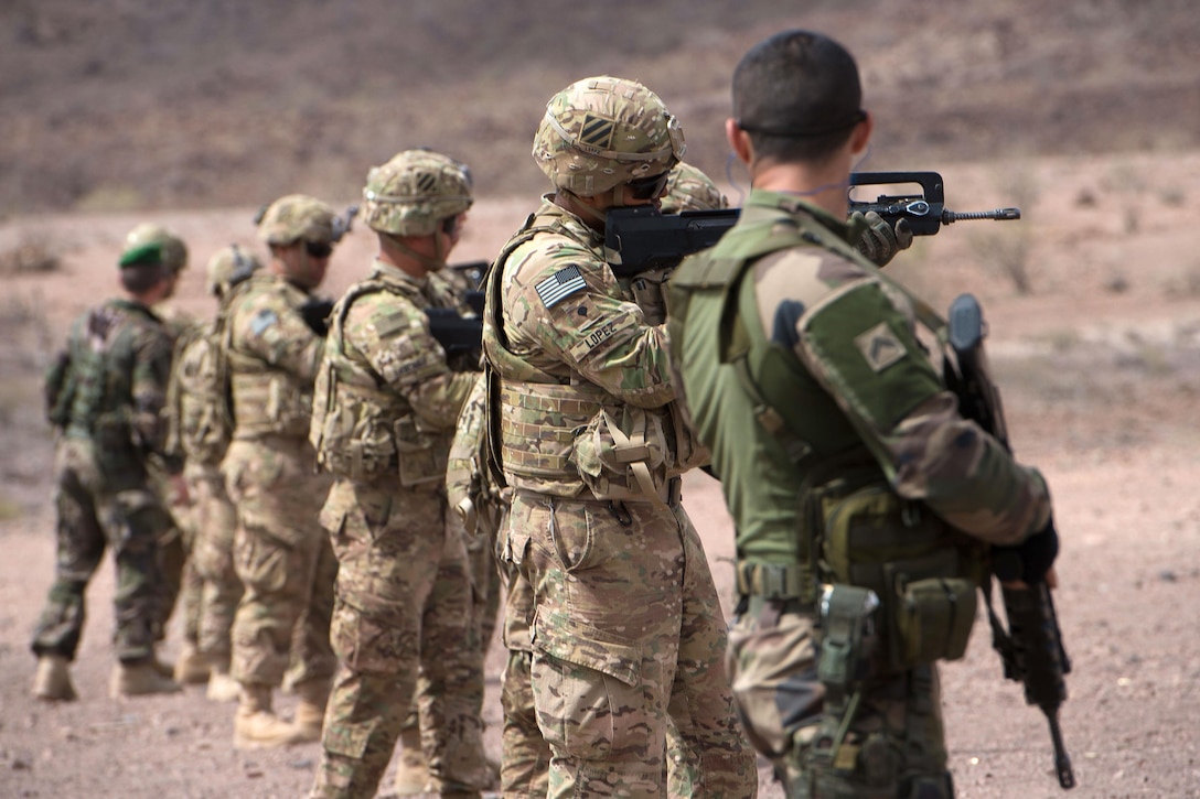 U.S. soldiers participate in small arms training with French Foreign Legion soldiers at a firing range in Djibouti, March 5, 2016. Air Force photo by Tech. Sgt. Barry Loo