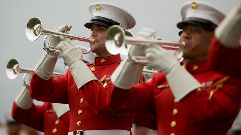 Marines with the United States Marine Drum and Bugle Corps perform at Marine Corps Air Station Miramar, California, March 11. These Marines wear red jackets which sets them apart from other bands in the Marine Corps.