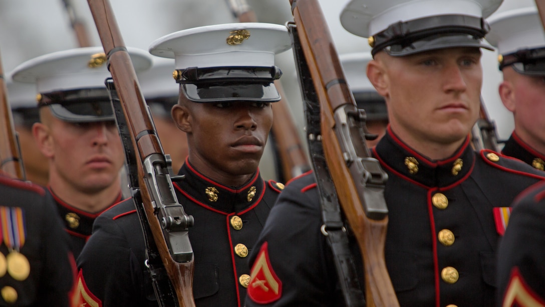 Marines with The Silent Drill Platoon march off of the parade deck at Marine Corps Air Station Miramar, California, March 11. Their performance was part of a Battle Color Ceremony at the air station.