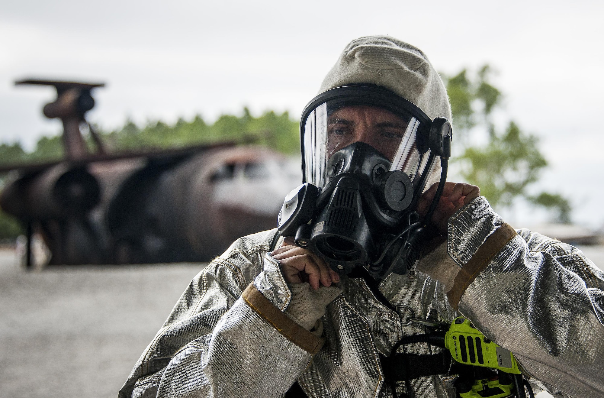 Staff Sgt. Matthew Harris, 919th Special Operations Civil Engineer Squadron, gears up prior to a live-fire training exercise March 4 at Hurlburt Field, Fla.  The Reserve Airmen teamed with their active-duty special operations firefighters to complete their annual live-fire training during the March unit training assembly.  (U.S. Air Force photo/Tech. Sgt. Sam King)