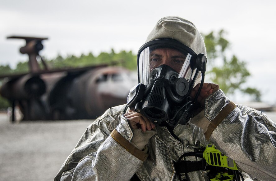 Staff Sgt. Matthew Harris, 919th Special Operations Civil Engineer Squadron, gears up prior to a live-fire training exercise March 4 at Hurlburt Field, Fla.  The Reserve Airmen teamed with their active-duty special operations firefighters to complete their annual live-fire training during the March unit training assembly.  (U.S. Air Force photo/Tech. Sgt. Sam King)