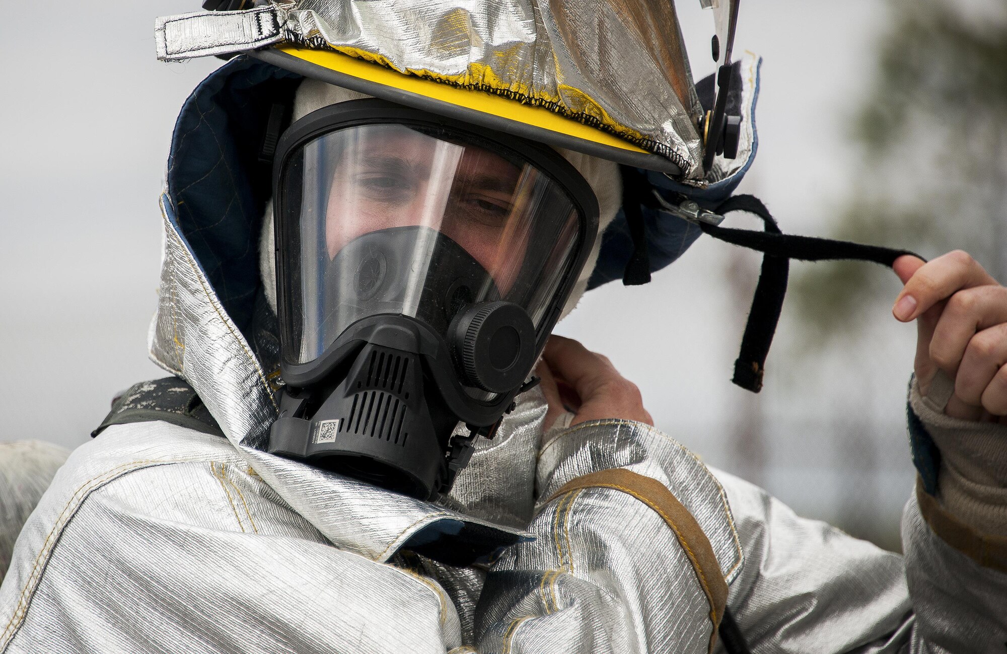 Staff Sgt. Matthew Harris, 919th Special Operations Civil Engineer Squadron, gears up prior to a live-fire training exercise March 4 at Hurlburt Field, Fla.  The Reserve Airmen teamed with their active-duty special operations firefighters to complete their annual live-fire training during the March unit training assembly.  (U.S. Air Force photo/Tech. Sgt. Sam King)