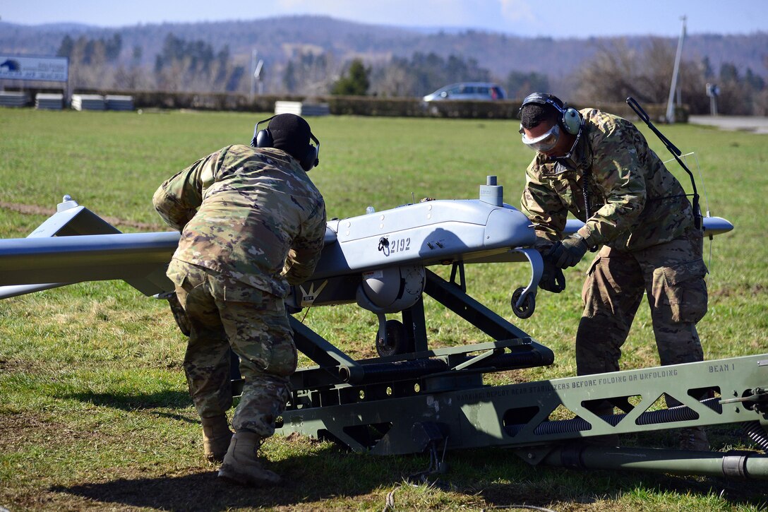 U.S. Army paratroopers conduct pre-flight checks on an RQ7B Shadow unmanned aircraft system during Exercise Rock Sokol at Aeroclub Postonja in Slovenia, March 2, 2016. Army photo by Paolo Bovo