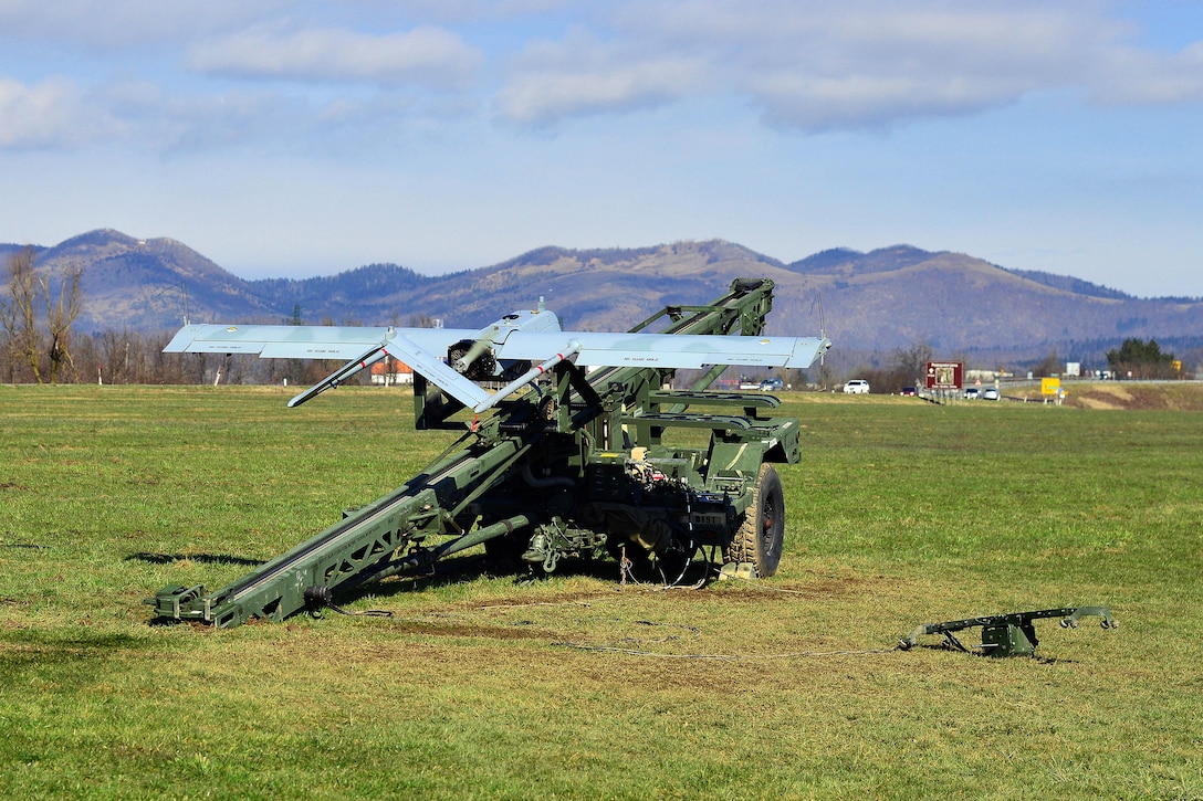 An RQ7B Shadow unmanned aircraft system prepares to launch from a nitrogen launcher during Exercise Rock Sokol at Aeroclub Postonja in Slovenia, March 2, 2016. Army photo by Paolo Bovo