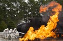 A team of 919th Special Operations Civil Engineer Squadron firefighters battle a huge blaze during a live-fire training exercise March 4 at Hurlburt Field, Fla.  The Reserve Airmen teamed with their active-duty special operations firefighters to complete their annual live-fire training during the March unit training assembly.  (U.S. Air Force photo/Tech. Sgt. Sam King)