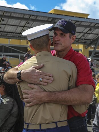 A Marine from India Company, 3rd Recruit Training Battalion, greets his loved one after graduating from recruit training at Marine Corps Recruit Depot San Diego, March 11. After graduation, all Marines are given 10 days of leave before taking the next step in training. Annually, more than 17,000 males recruited from the Western Recruiting Region are trained at MCRD San Diego.
