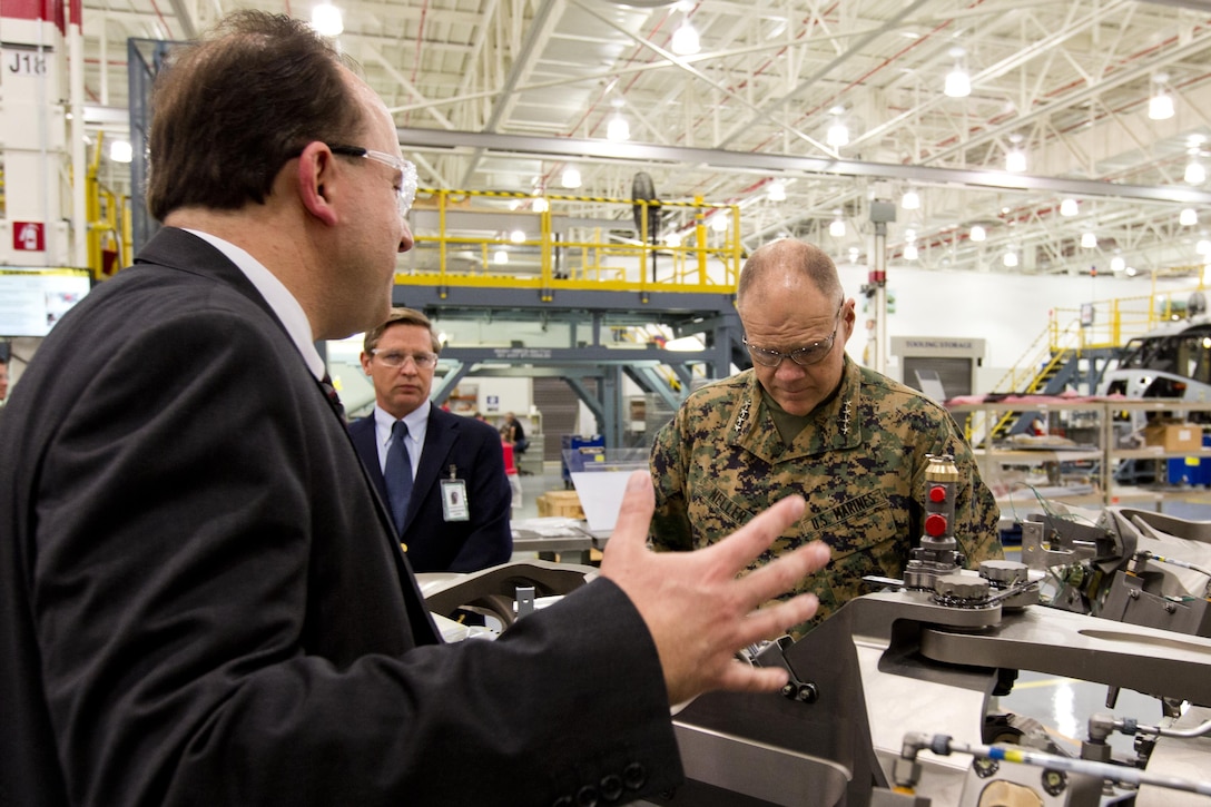 Commandant of the Marine Corps Gen. Robert B. Neller listens to a brief during a tour at Sikorsky Aircraft Corporation, Jupiter, Fla., March 8, 2016. Neller visited the facility to get an overview of the CH-53K King Stallion aircraft program and visit Marines. (U.S. Marine Corps photo by Staff Sgt. Gabriela Garcia/Released)