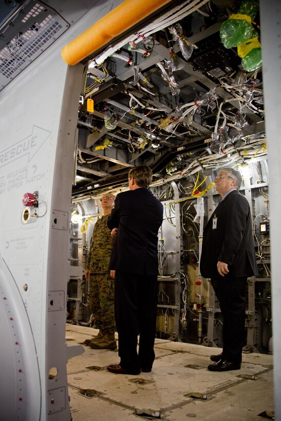 Commandant of the Marine Corps Gen. Robert B. Neller looks inside of a CH-53K King Stallion aircraft at Sikorsky Aircraft Corporation, Jupiter, Fla., March 8, 2016. Neller visited the facility to get an overview of the CH-53K program and visit Marines. (U.S. Marine Corps photo by Staff Sgt. Gabriela Garcia/Released)