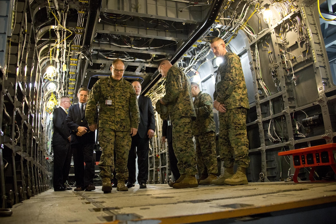 Commandant of the Marine Corps Gen. Robert B. Neller looks inside of a CH-53K King Stallion aircraft at Sikorsky Aircraft Corporation, Jupiter, Fla., March 8, 2016. Neller visited the facility to get an overview of the CH-53K program and visit Marines. (U.S. Marine Corps photo by Staff Sgt. Gabriela Garcia/Released)