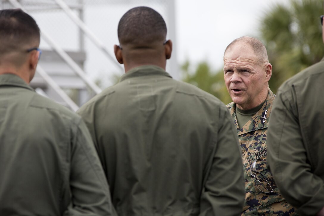 Commandant of the Marine Corps Gen. Robert B. Neller speaks with Marine maintainers, with CH-53K Super Stallion aircraft Marine Detachment, at Sikorsky Aircraft Corporation, Jupiter, Fla., March 8, 2016. Neller visited the facility to get an overview of the CH-53K program and visit Marines. (U.S. Marine Corps photo by Staff Sgt. Gabriela Garcia/Released)