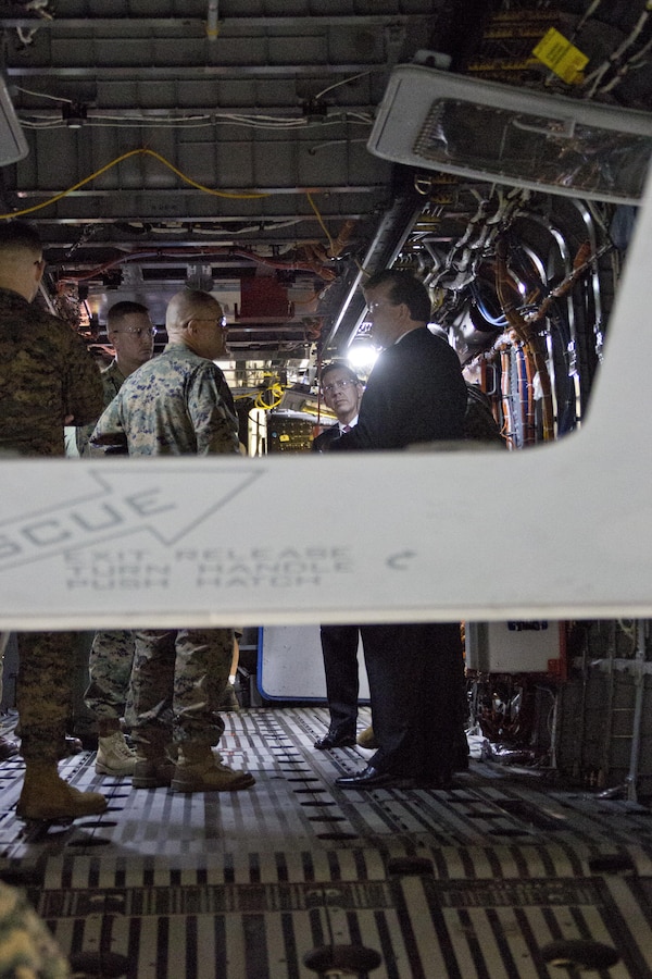Commandant of the Marine Corps Gen. Robert B. Neller listens to an expert inside a CH-53K Super Stallion aircraft at Sikorsky Aircraft Corporation, Jupiter, Fla., March 8, 2016. Neller visited the facility to get an overview of the CH-53K program and visit Marines. (U.S. Marine Corps photo by Staff Sgt. Gabriela Garcia/Released)