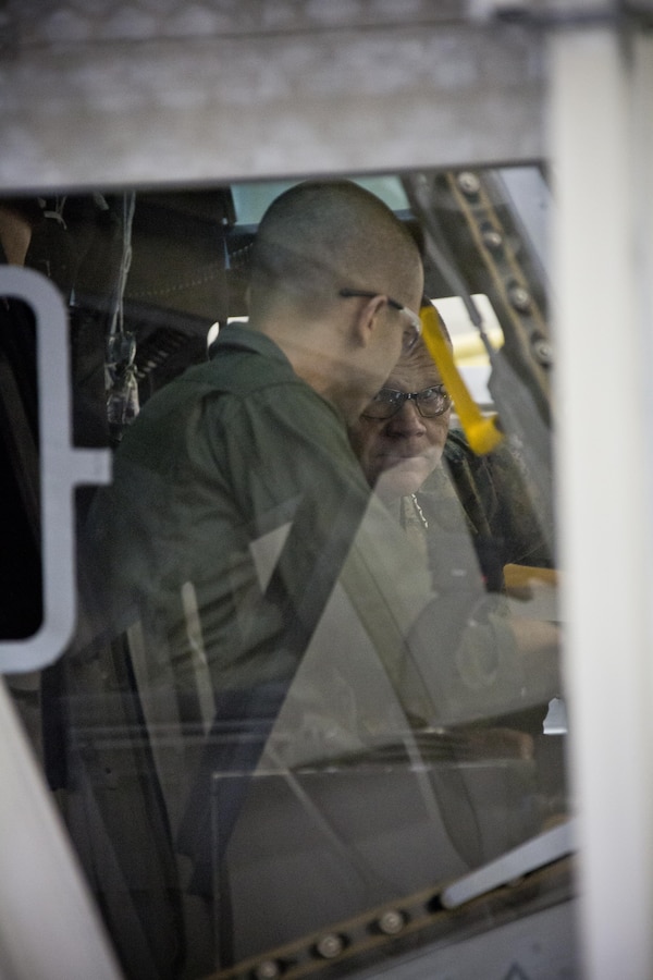 Commandant of the Marine Corps Gen. Robert B. Neller listens to an expert inside a CH-53K Super Stallion aircraft at Sikorsky Aircraft Corporation, Jupiter, Fla., March 8, 2016. Neller visited the facility to get an overview of the CH-53K program and visit Marines. (U.S. Marine Corps photo by Staff Sgt. Gabriela Garcia/Released)