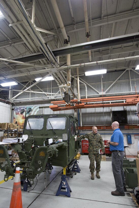 Commandant of the Marine Corps Gen. Robert B. Neller listens to a brief during a tour of Marine Depot Maintenance Command at Albany, Ga., March 9, 2016. Neller toured the repair facility to assess its operational capabilities and meet the Marines and civilian employees. (U.S. Marine Corps photo by Staff Sgt. Gabriela Garcia/Released)
