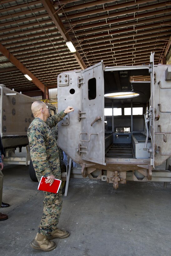 Commandant of the Marine Corps Gen. Robert B. Neller looks at a vehicle during a tour of Marine Depot Maintenance Command at Albany, Ga., March 9, 2016. Neller toured the repair facility to assess its operational capabilities and meet the Marines and civilian employees. (U.S. Marine Corps photo by Staff Sgt. Gabriela Garcia/Released)